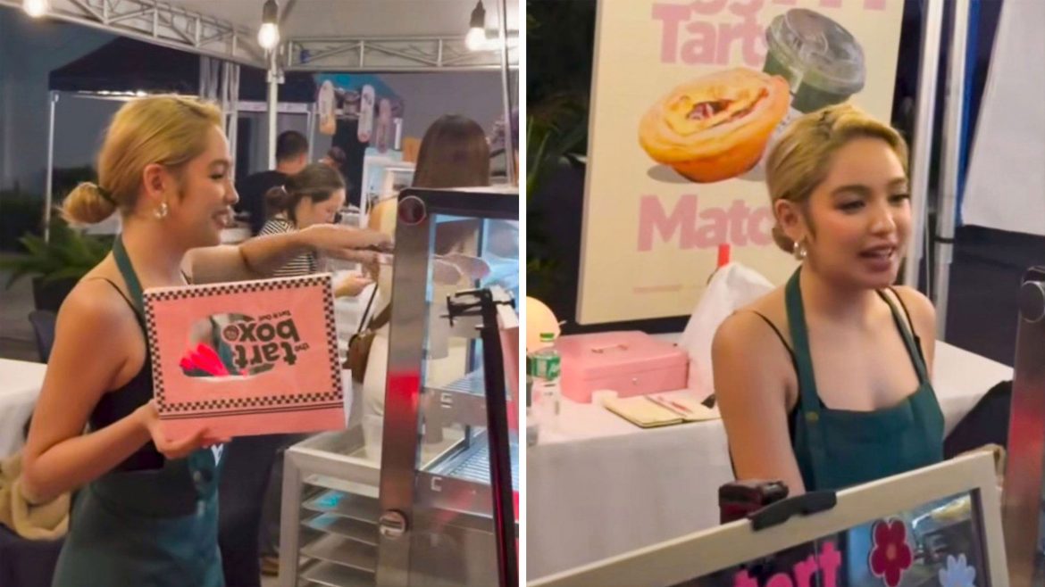 Andrea Brillantes egg tart vendor smiling while serving customers at food stall