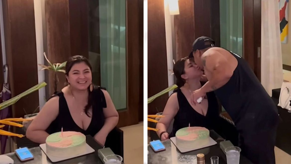Angel Locsin smiling beside her birthday cake during her birthday message celebration