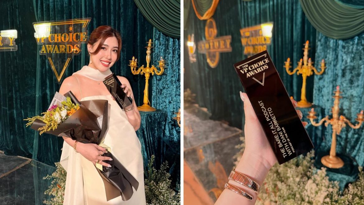 Dani Barretto holding trophy after Bare It All Podcast wins at VP Choice Awards