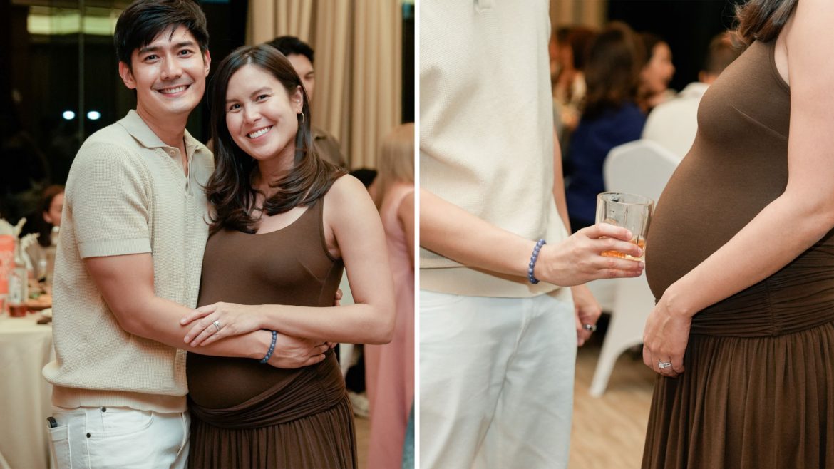 Robi Domingo and Maiqui Pineda smiling together during their baby celebration event