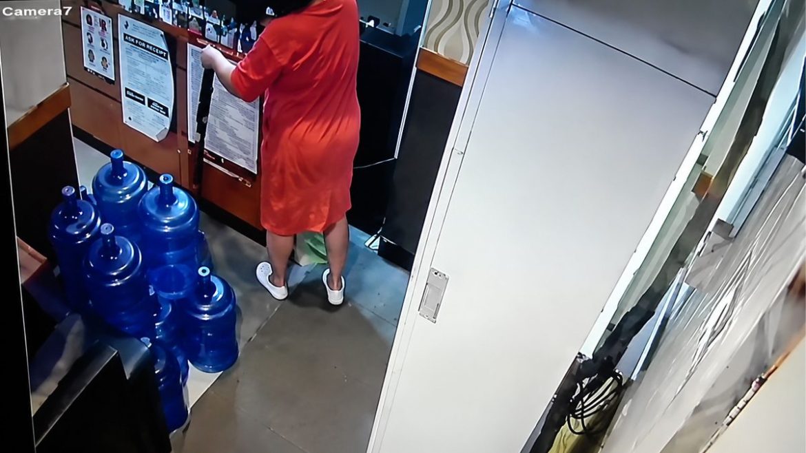 CCTV screenshot showing an alleged paranormal figure inside a casino hallway during an evening shift