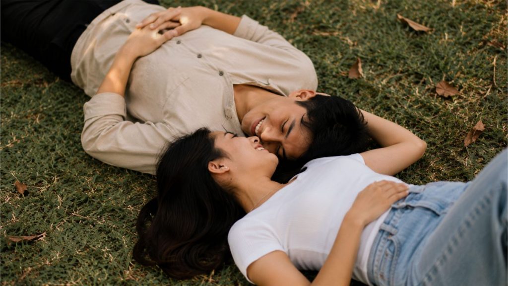 Young Filipino couple relaxing together outdoors