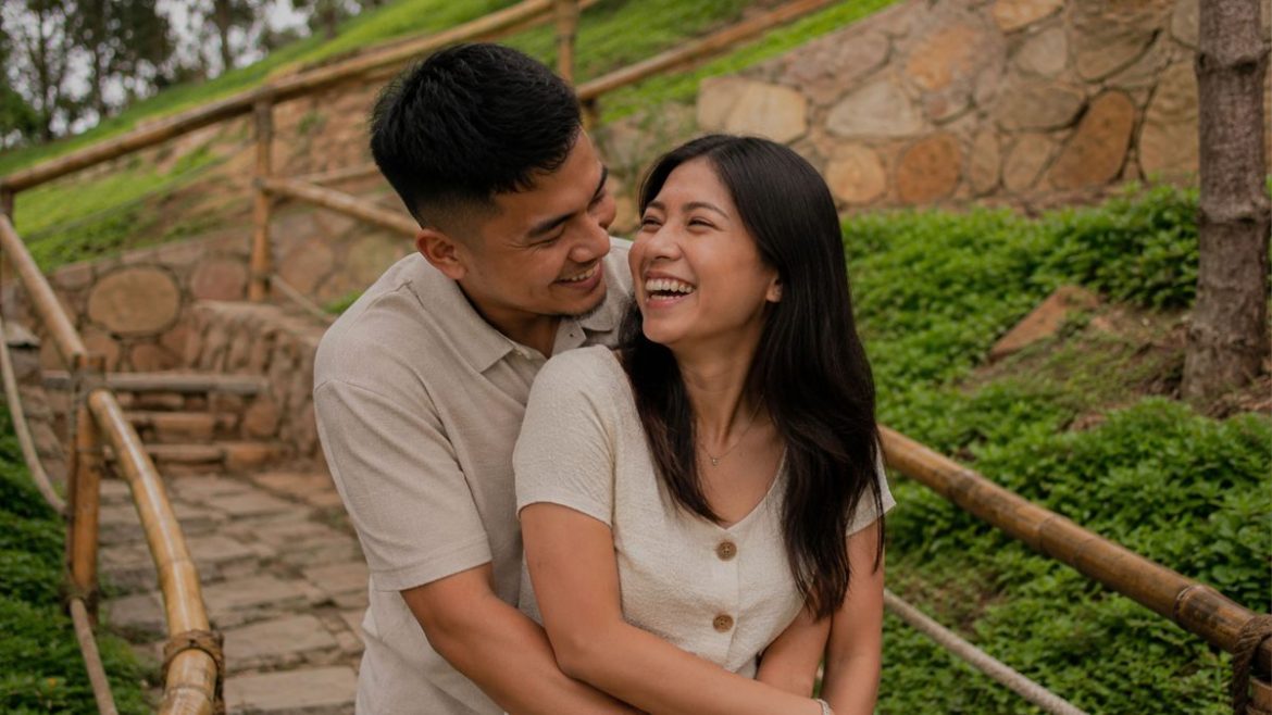 Filipino couple sharing a joyful and emotionally connected moment outdoors