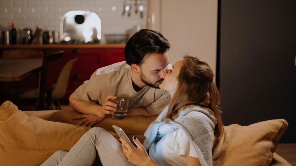 Young Filipino couple spending quiet time together at home, representing modern live-in relationships in the Philippines.