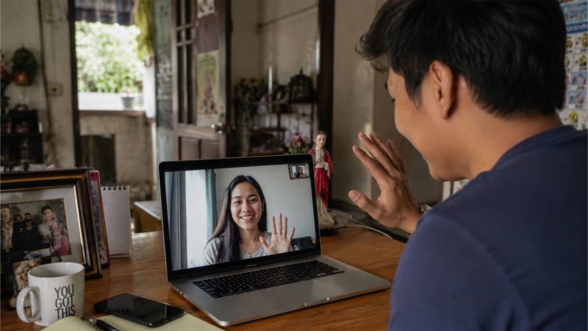 Filipino husband video calling his wife from home while maintaining a long-distance OFW marriage.