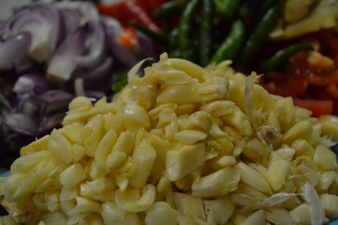 Fresh chopped garlic, a well-known ingredient used in herbal medicines for its health-supporting properties.