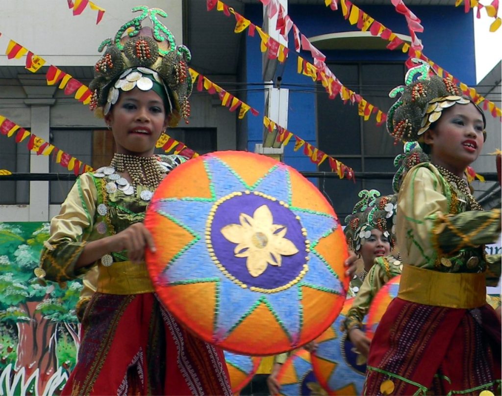 Festival participants present traditional costumes and cultural symbols during the Kadayawan sa Dabaw Festival.