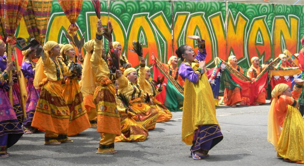 Street dancers performing during the Kadayawan sa Dabaw Festival parade in Davao City.