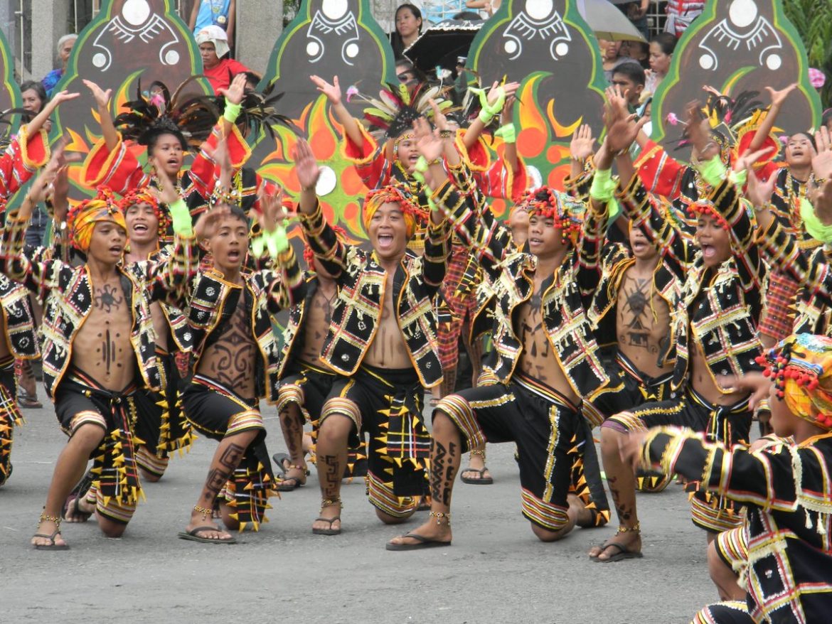 Indigenous performers in traditional attire participate in the Kadayawan sa Dabaw Festival street dancing competition.